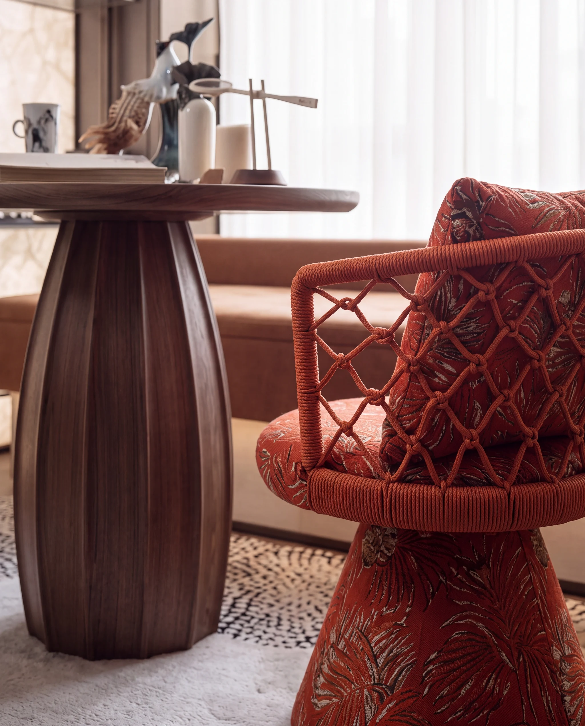 Detail: jacquard chair and fluted timber table