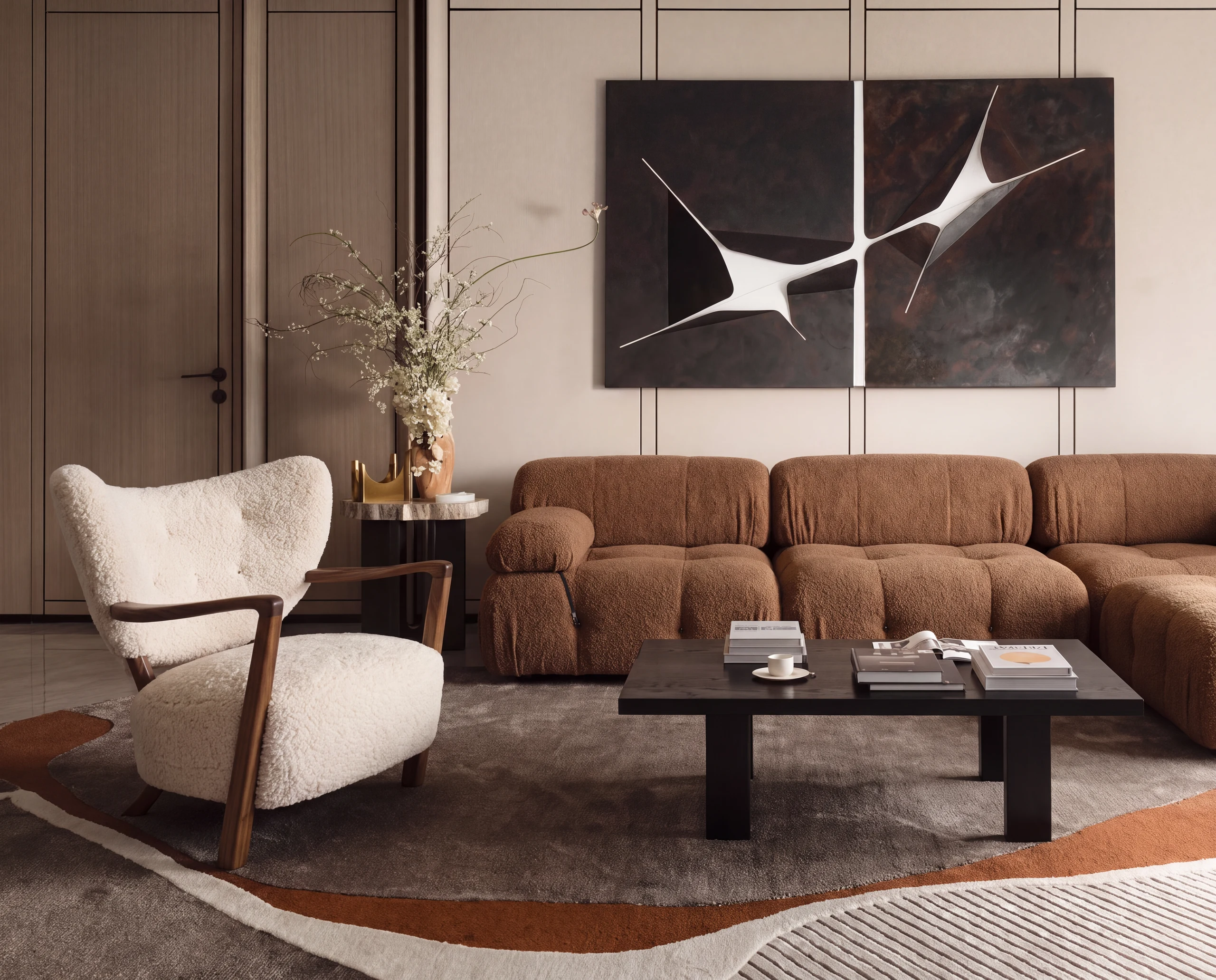 A relief artwork above the modular sofa