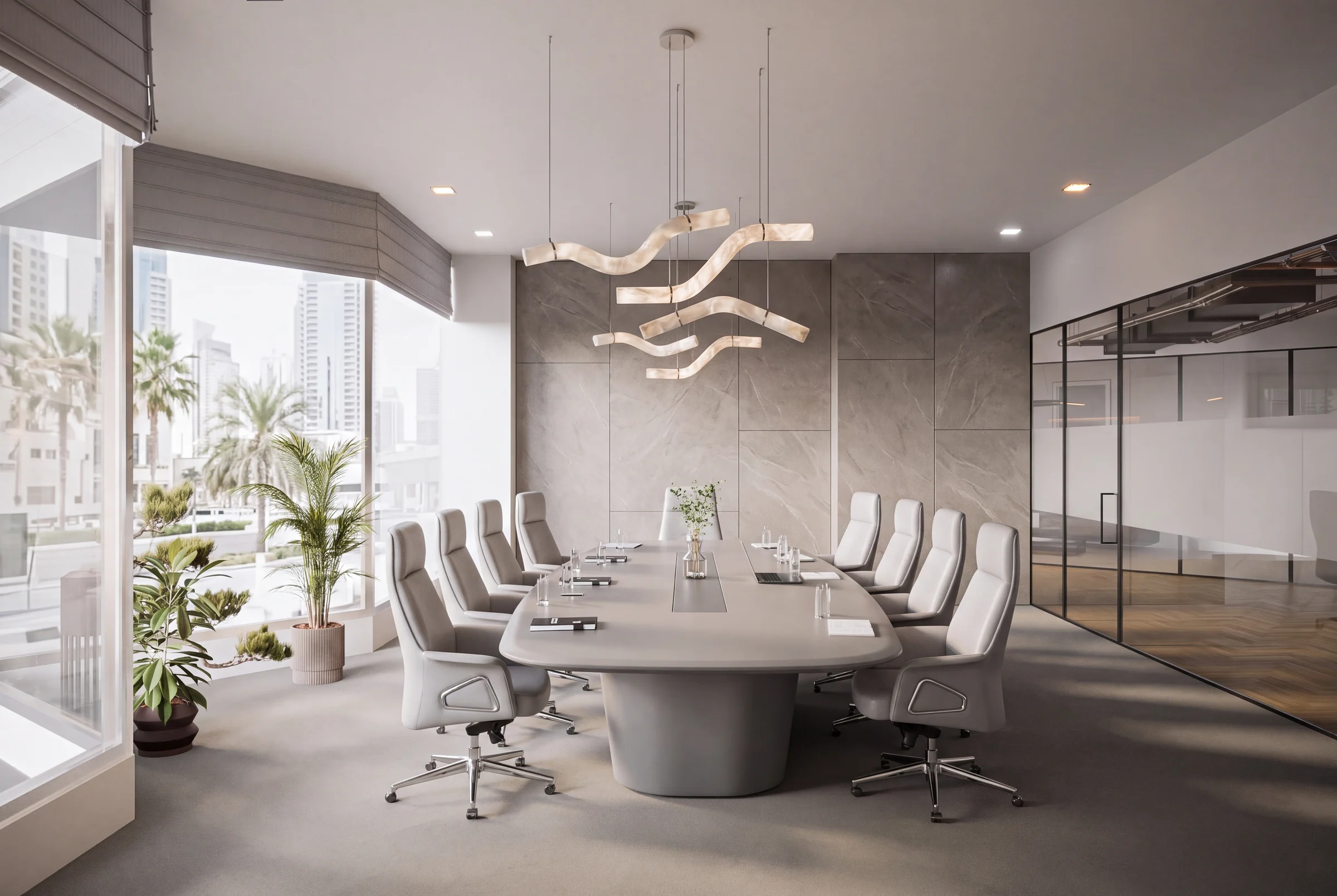After: Meeting room with stone-finish wall panels and sculptural pendants
