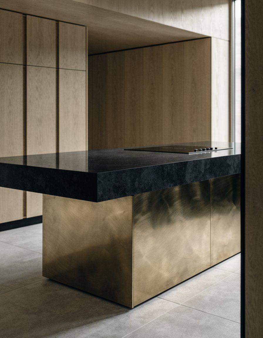 Kitchen detail: stone, brass and oak